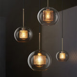 Hessa Contemporary Golden Pendant Light, Glass, Globe/Cylindric
